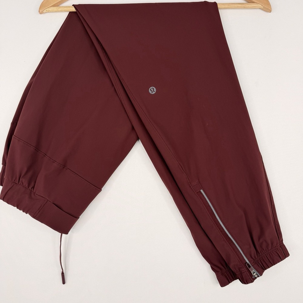 Lululemon Surge Jogger Pants Merlot Burgundy Ankle Zip Workout Stretch Waist S